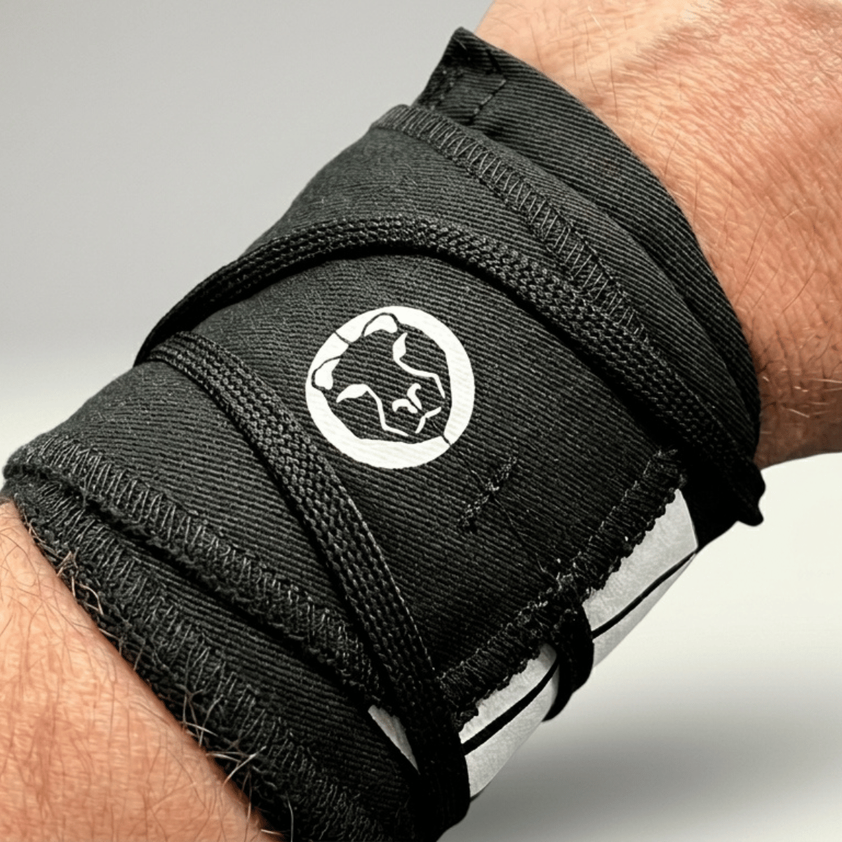 Mammal Strength lightweight wrist wraps providing flexible wrist support for weightlifting and gym training